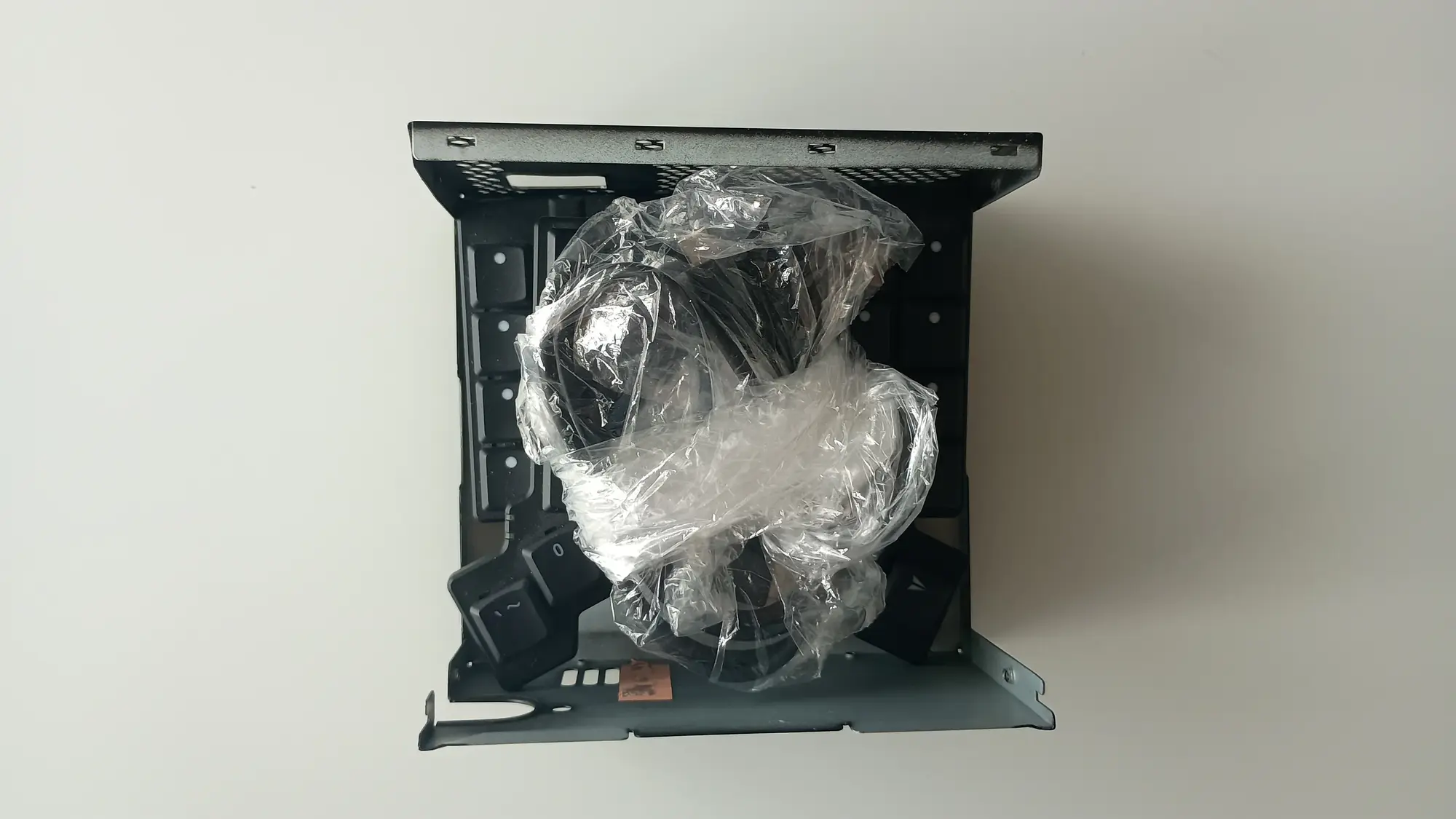 Open case with keyboard and cables packed inside